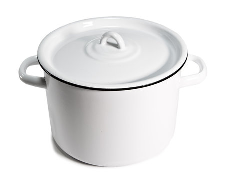 The white enameled pan on a white background