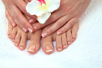 Closeup photo of a beautiful female feet with pedicure