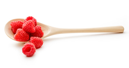 Fresh raspberry in wooden spoon