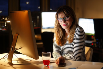 Businesswoman working late