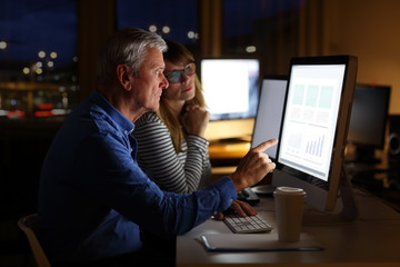 Business people working late night