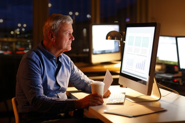 Businessman working at night