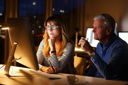 Business people working late night