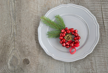 Christmas table place setting with christmas pine branches, decorations. Christmas holidays background.  Top view with copy space. Christmas menu concept.