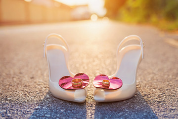 Bridal shoes and wedding rings