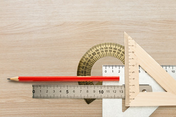 Drafting wooden and steel tools with pencil