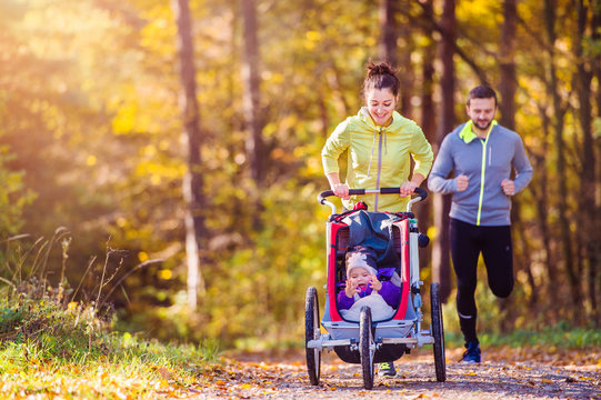 Young Family Running