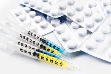 Syringes and tablets