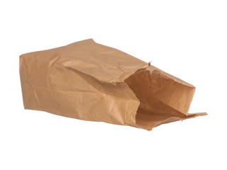 Open brown paper bag laying down isolated on white