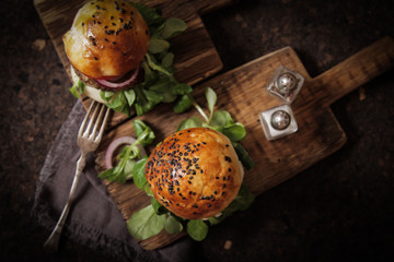 Obraz na płótnie Canvas homemade veggie burger in a bun with sesame seeds of beer. delic