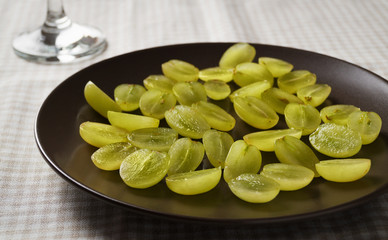 Chopped grapes on table