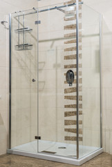 Modern shower with glass door in luxury bathroom