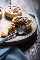 Hand decorated artisan pecan nut tarts