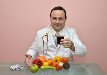 Doctor and healthy juices and food