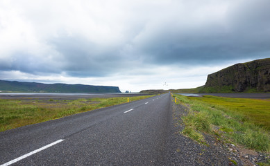 Icelandic landscapes with road and rock