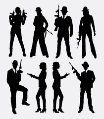 Gangster with gun, male and female pose silhouettes. Good use for symbol, game elements, logo, web icon, mascot, sticker, sign, or any design you want. Easy to use, edit or change color. - obrazy, fototapety, plakaty