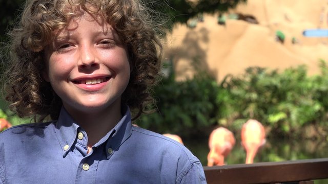 Young Boy Smiling in Nature