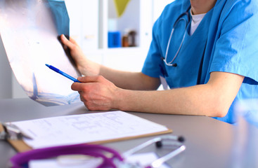 doctor and patient at the table. solution