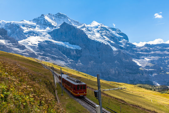Train running under the Jungfrau