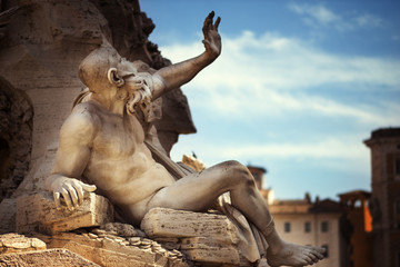 Fototapeta na wymiar Statue in Fountain, Piazza Navona, Rome, Italy