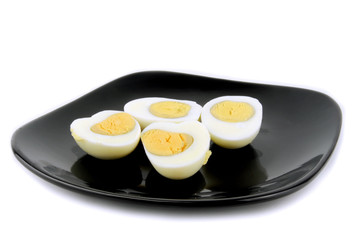 eggs on plate isolated on white