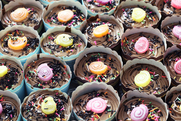 row of chocolate cupcake