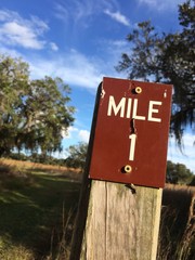 1 mile marker at a hiking trail