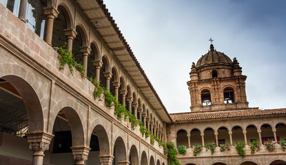 Low angle view of church against cloudy sky, Cusco, Peru