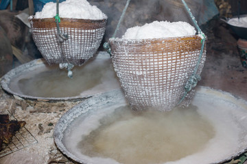 Boiling rock salt from underground water in Nan Province,Thailand
