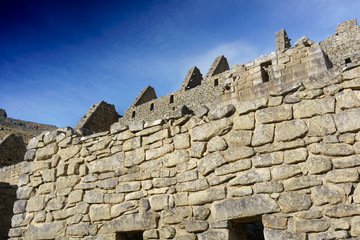 Fototapeta premium Low angle view of stone wall, Machu Picchu, Cusco Region, Urubamba Province, Machupicchu District, Peru