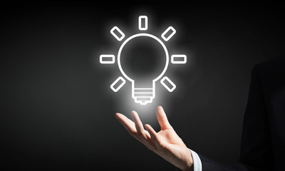 Bright idea in hand