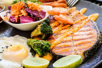 salmon steak grilled and side dish for happy dinner