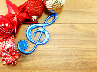 merry christmas and happy new year with colorful decoration on wooden background