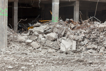 Rubble in front of ruined building
