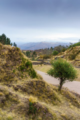 Fototapeta na wymiar Empty mountain road against blue sky, Cusco, Peru