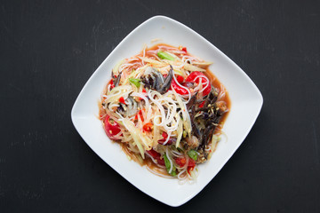 Thai delicious raw papaya salad with unique taste hot and spicy,