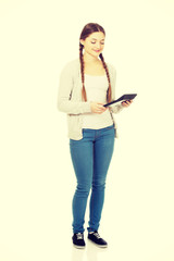 Young woman hold digital calculator. 