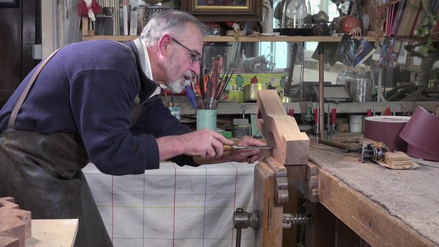 carpenter working in his workshop