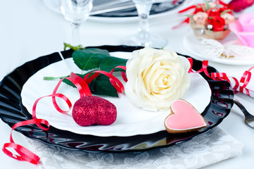 Holiday romantic table setting with pink roses