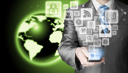 Business man using smart phone with social media icon set