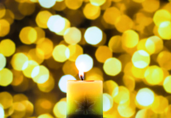 candle light in yellow bokeh background