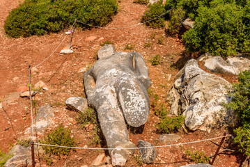 Marble Kouros is the type of the statue, a sample of ancient Greek art, Melanes village, Naxos island, Cyclades, Greece.