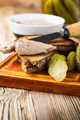 Homemade chicken liver pate  on rustic wooden table