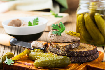 Homemade chicken liver pate  on rustic wooden table
