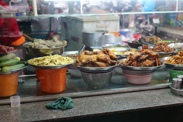 Vietnamese street cafe. The dishes on the counter.