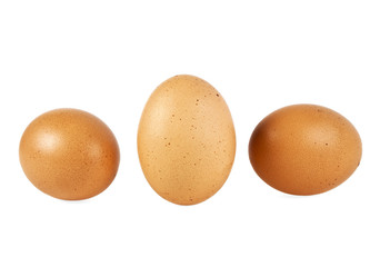 Brown chicken eggs isolated on white background