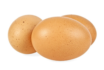 Brown chicken eggs isolated on white background