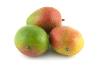 Three ripe tropical fruit mango isolated on white closeup