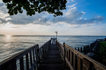 Bridge and pavillion on the sea with people walk on the bridge