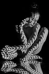 The  body of woman with black and white pattern